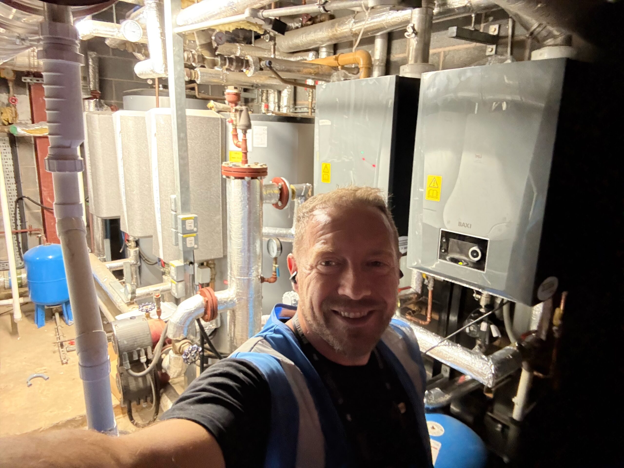 Peter Jefferson of CombiCert in a Telford plant room with Baxi commercial boilers
